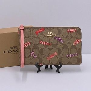 EUC Coach Large Corner Signature Candy Print Wristlet